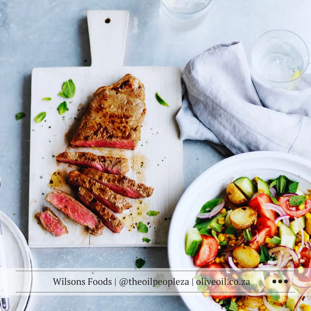 Recipes 4 Steak marinated in peri-peri sauce on a braai grill