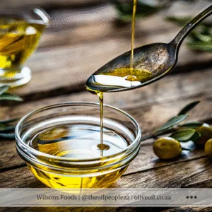 Malva Pudding 2 Pouring extra virgin olive oil from bottle