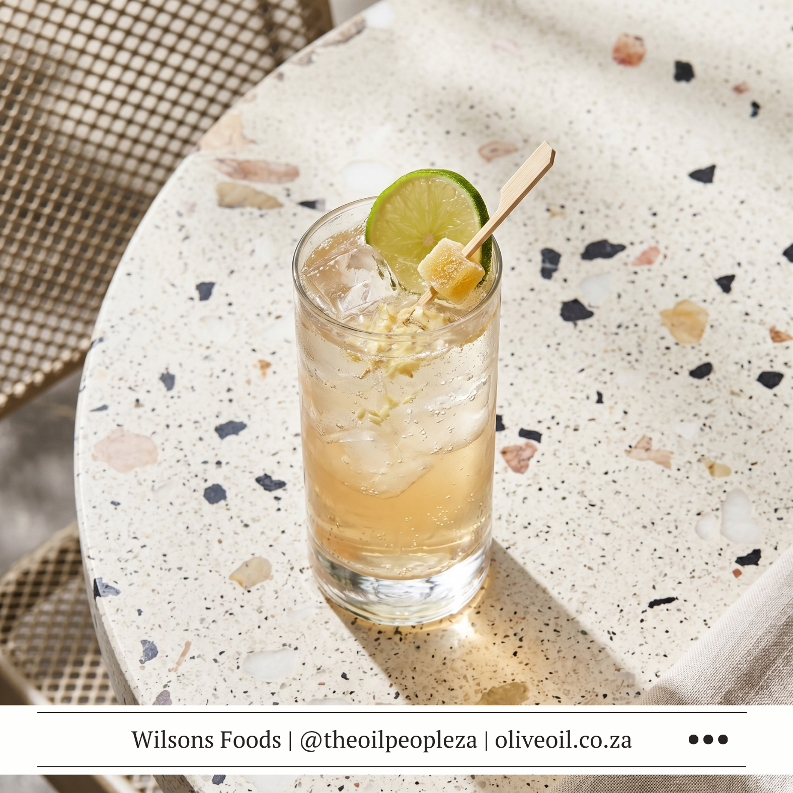 Lime Tequila Tonic Recipe 1 A tequila tonic in a tall glass with ice, cucumber slices and a lime wedge