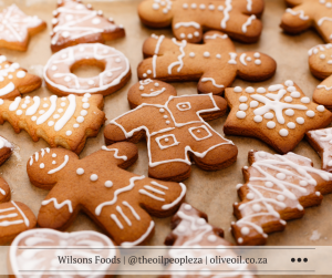Soft homemade gingerbread cookies made with Extra Virgin Olive Oil, decorated for Christmas.