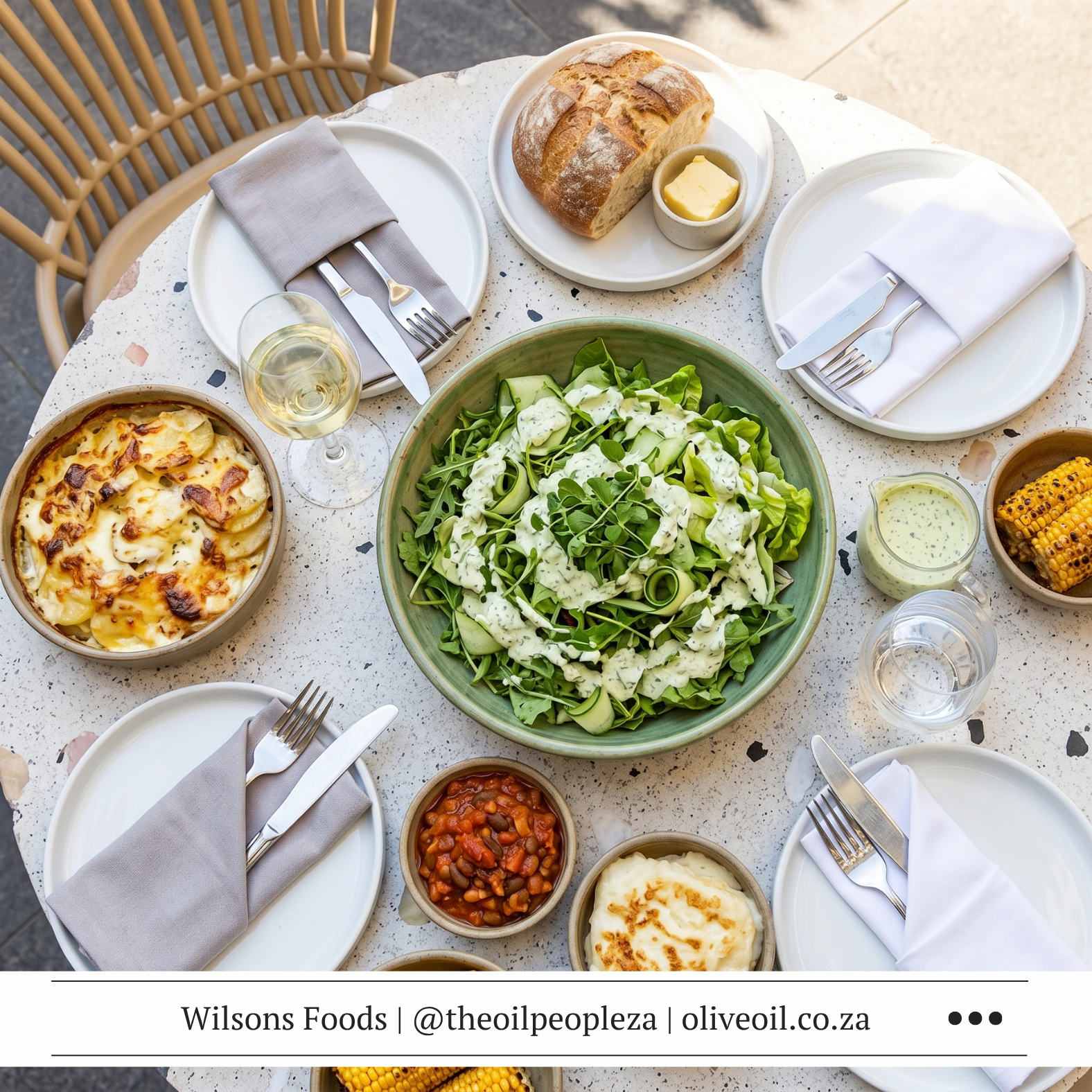 A bowl of bright green avocado dressing with fresh mint, ready for drizzling