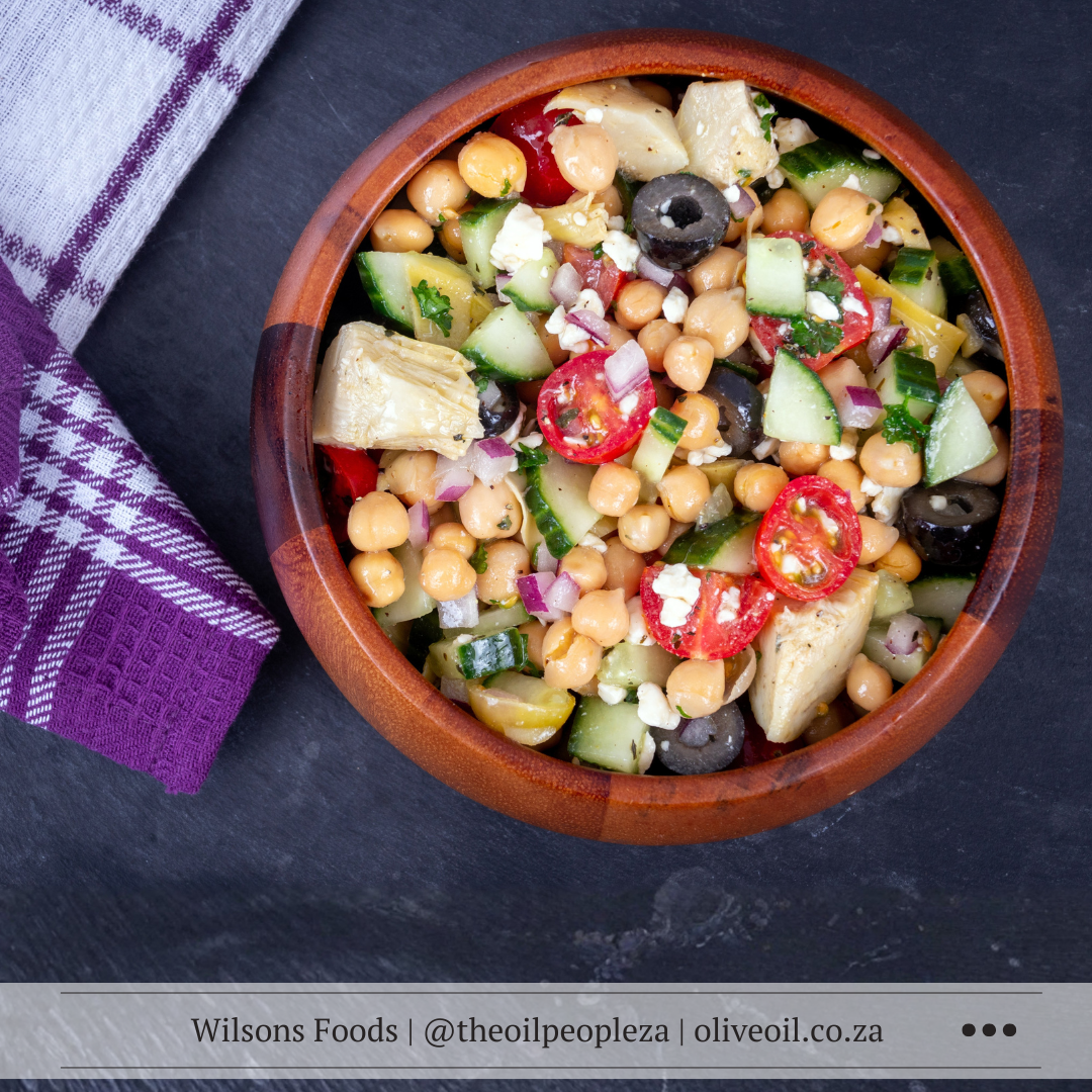 Mediterranean summer salad with fresh vegetables and olive oil dressing