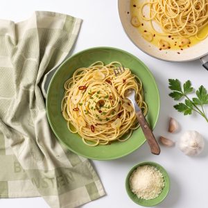 Aglio e Olio spaghetti tossed with Wilson’s Garlic Flavoured Oil, chilli and parsley