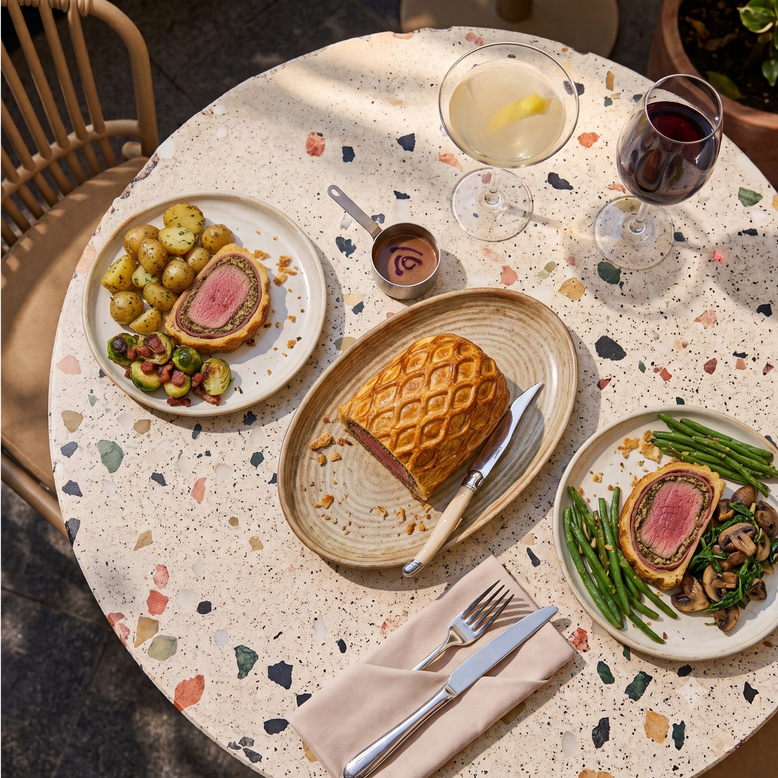 Italian-Style Beef Wellington – A Festive Classic Recipe 1 Sliced Italian-style Beef Wellington with prosciutto and porcini duxelles on a festive table