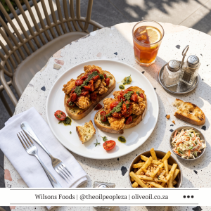 Buttermilk chicken breasts on toasted ciabatta with tomato ezme, made with Wilson's Extra Virgin Olive Oil