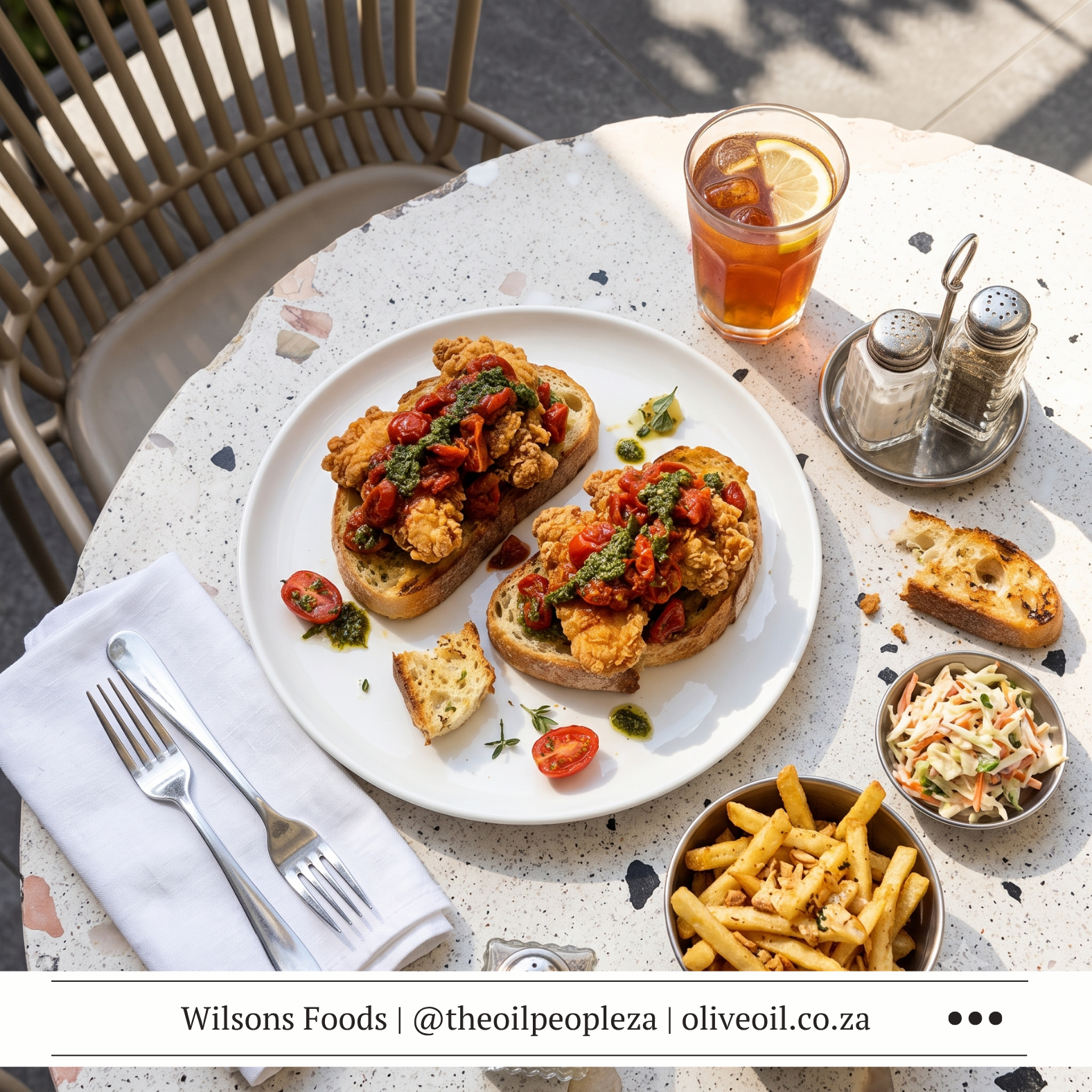 Buttermilk chicken breasts on toasted ciabatta with tomato ezme, made with Wilson's Extra Virgin Olive Oil