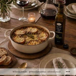 Cheesy onion soup with bubbling Gruyère croutons drizzled with Wilson's Foods Extra Virgin Olive Oil