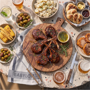Braai Lamb Chops charred over the coals, basted in Wilson's Rosemary Flavoured Oil