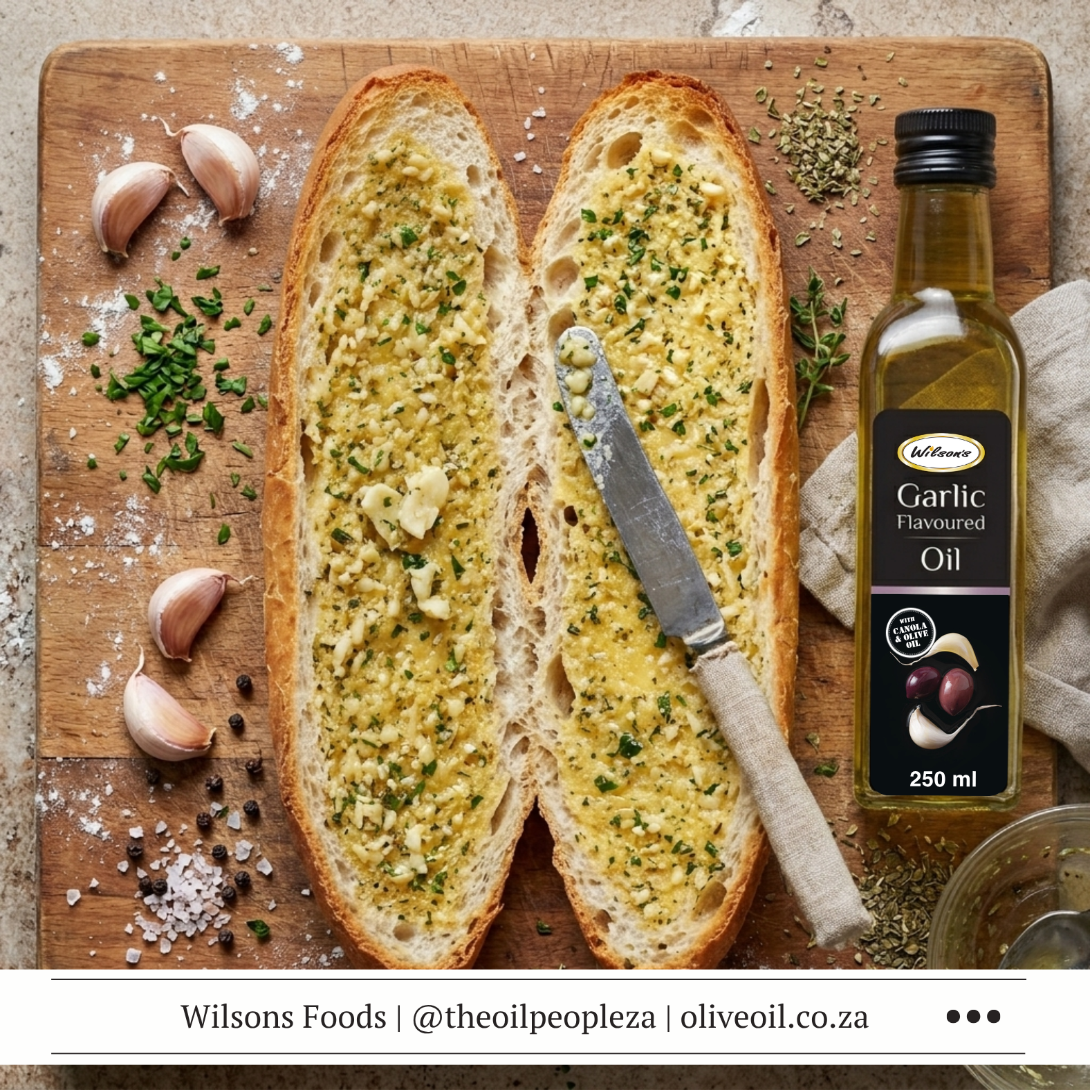Vegan garlic bread sliced on foil made with Wilson's Foods Garlic Flavoured Oil and Peri-Peri Flavoured Oil